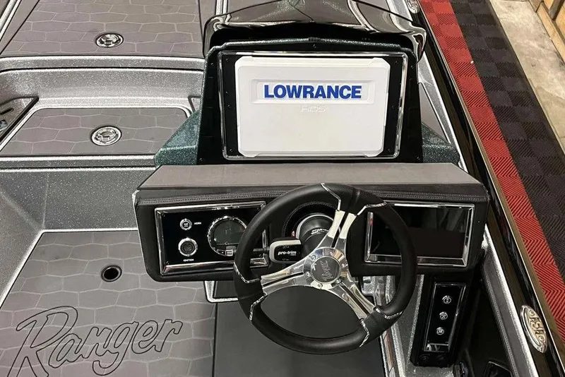 Slide: The Image of Cockpit of 2026 Ranger Z520R Cup-Equipped boat with Lowrance display and steering wheel. - 4