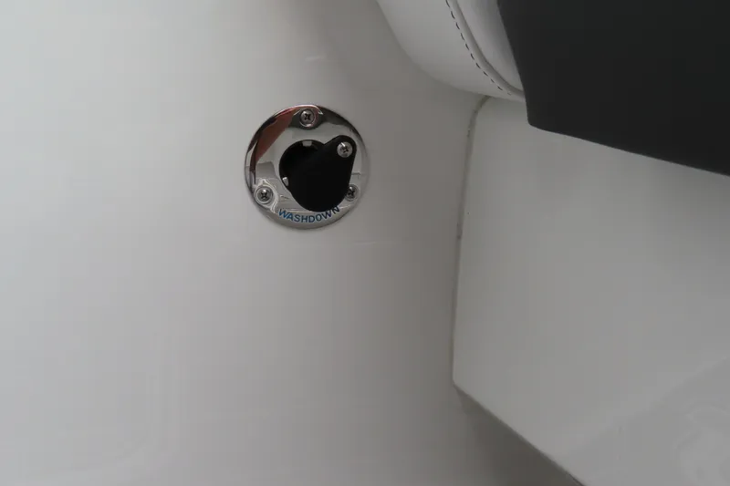 Slide: The Image of Washdown outlet on 2026 Sunsation 32CCX boat, close-up view. - 10