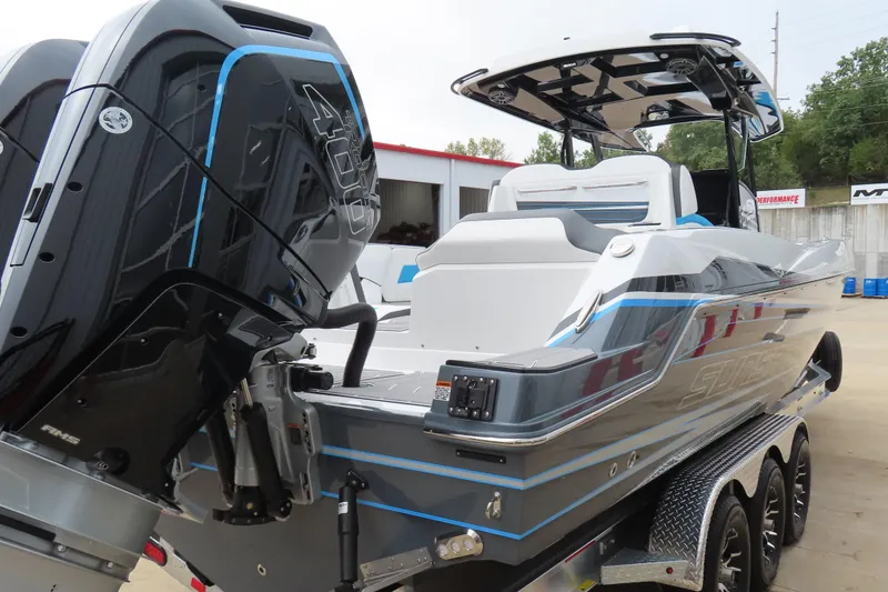 Slide: The Image of 2026 Sunsation 32CCX boat with powerful outboard engines, sleek design, and modern features. - 13