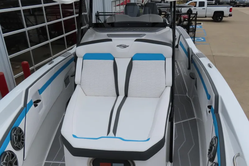 Slide: The Image of 2026 Sunsation 32CCX boat interior with white and blue seating, modern design. - 18