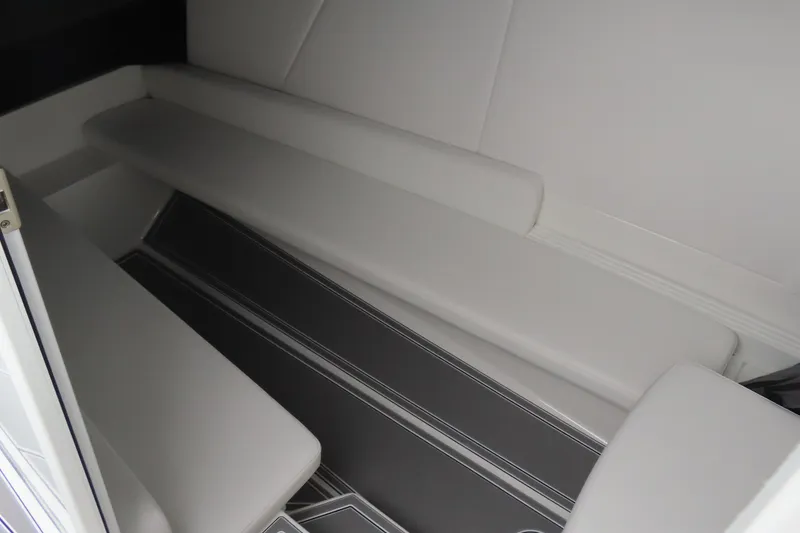 Slide: The Image of 2026 Sunsation 32CCX interior seating with sleek, modern design and comfortable upholstery. - 22