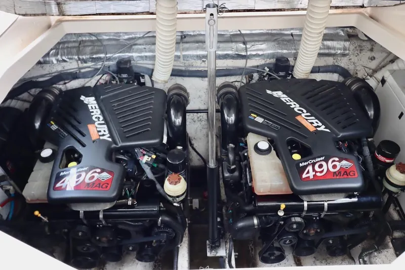 Slide: The Image of Twin MerCruiser 496 MAG engines in a 2006 Rinker 360 Express Cruiser. - 29