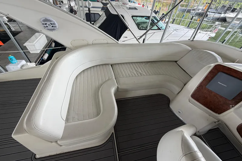 Slide: The Image of 2004 Meridian 341 Sedan interior with white seating and modern dashboard. - 17