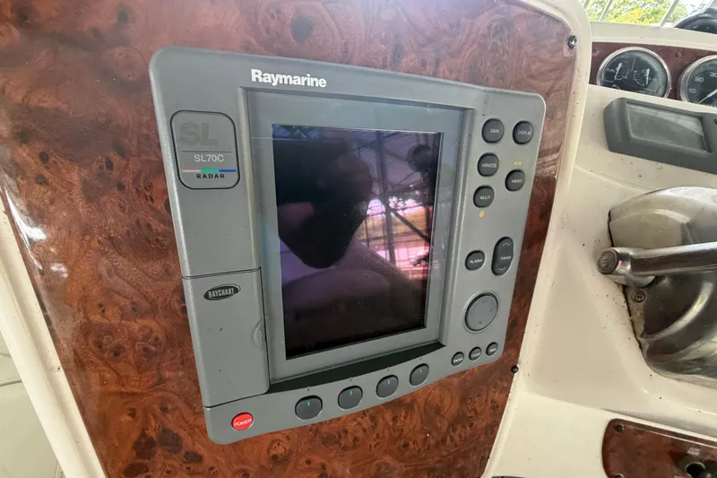 Slide: The Image of Raymarine SL70C radar display on 2004 Meridian 341 Sedan yacht dashboard. - 22