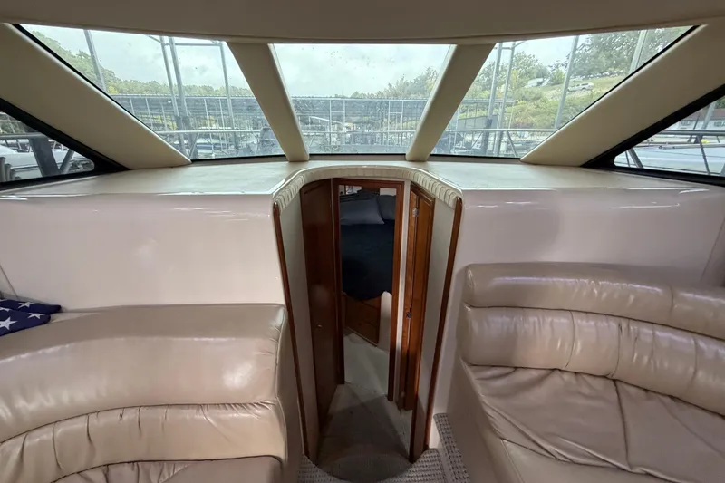 Slide: The Image of Interior of a 2004 Meridian 341 Sedan yacht with leather seating and cabin view. - 30