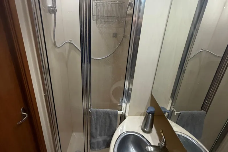 Slide: The Image of Bathroom interior of 2004 Meridian 341 Sedan yacht with shower and sink. - 36