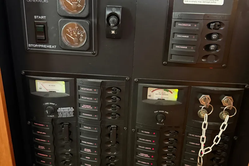 Slide: The Image of Control panel of a 2004 Meridian 341 Sedan with gauges and switches. - 37