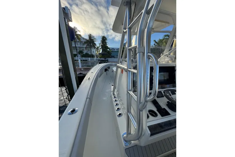 Slide: The Image of 2022 SeaVee 322 Z boat deck with stainless steel railings and control panel. - 17