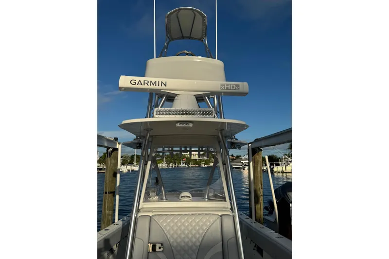 Slide: The Image of 2022 SeaVee 322 Z boat with Garmin xHD2 radar, docked in a marina. - 23