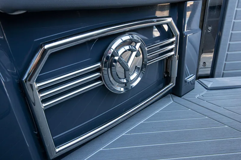 Slide: The Image of 2024 Cruisers Yachts 38 GLS OB, chrome detail on sleek blue exterior. - 12