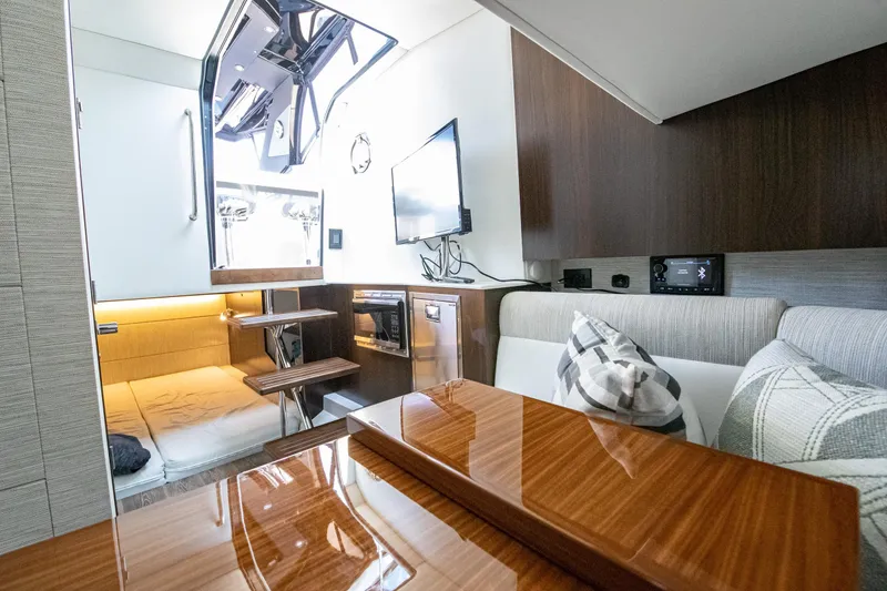Slide: The Image of Luxurious interior of 2024 Cruisers Yachts 38 GLS OB with modern amenities and stylish design. - 18