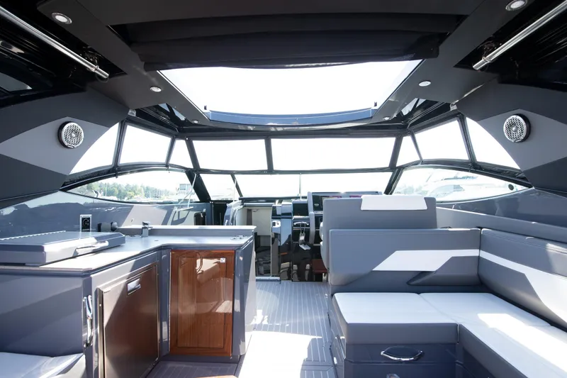 Slide: The Image of Luxurious interior of 2024 Cruisers Yachts 38 GLS OB with modern seating and sleek design. - 24