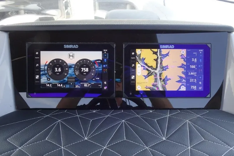Slide: The Image of Simrad displays on 2026 Harris Grand Mariner 250 dashboard, showing navigation and engine data. - 17