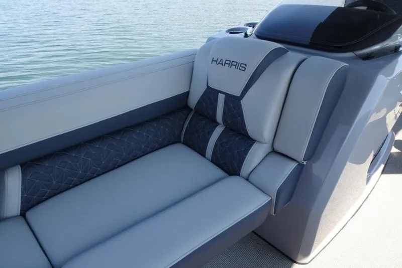 Slide: The Image of 2026 Harris Grand Mariner 250 boat interior with luxurious seating and elegant design. - 21