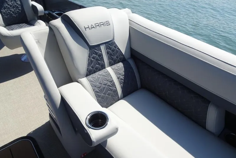Slide: The Image of Luxurious seating on 2026 Harris Grand Mariner 250 pontoon boat with elegant design and cup holder. - 22