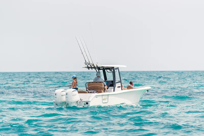 Slide: The Image of 2026 Sea Hunt Ultra 265 SE boat on open ocean, featuring dual Yamaha engines. - 5
