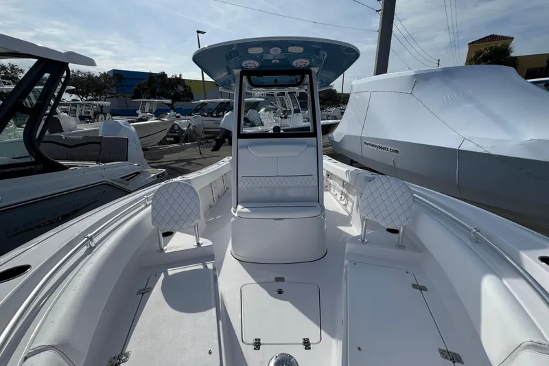 Slide: The Image of 2026 Sportsman Heritage 231 Center Console boat, featuring spacious seating and modern design. - 15
