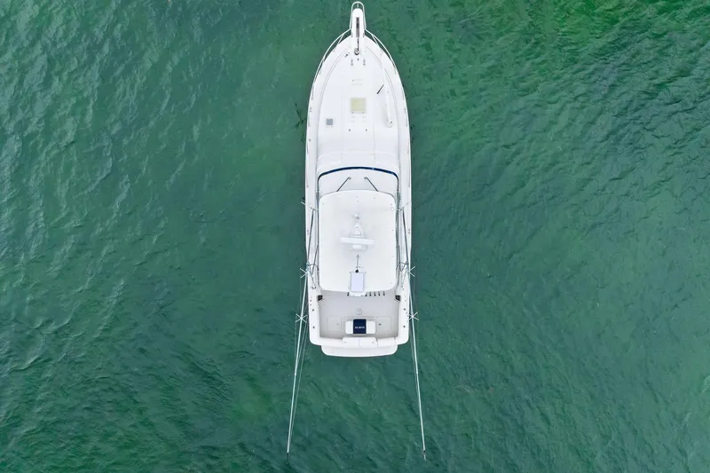 Slide: The Image of Aerial view of 2006 Bertram 39 Convertible yacht on green water. - 19