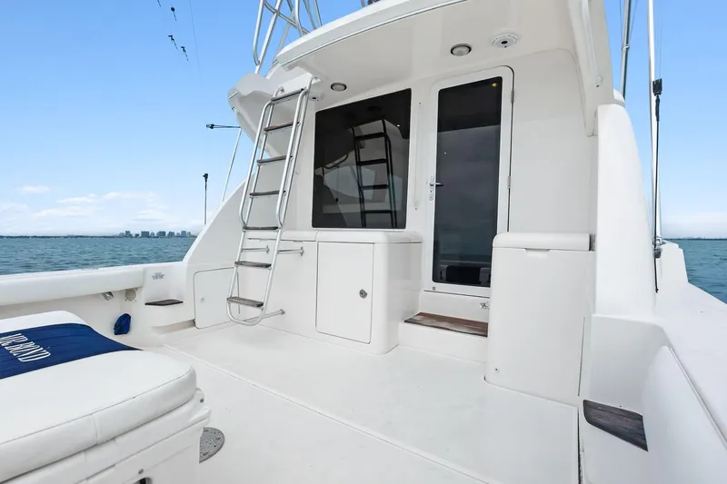 Slide: The Image of 2006 Bertram 39 Convertible yacht deck with ladder and ocean view. - 24