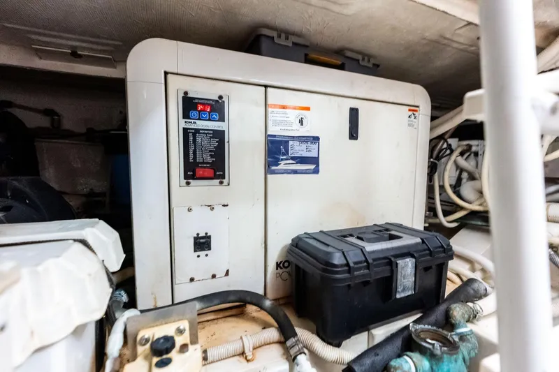 Slide: The Image of Engine room of 2006 Bertram 39 Convertible with Kohler generator and equipment. - 58