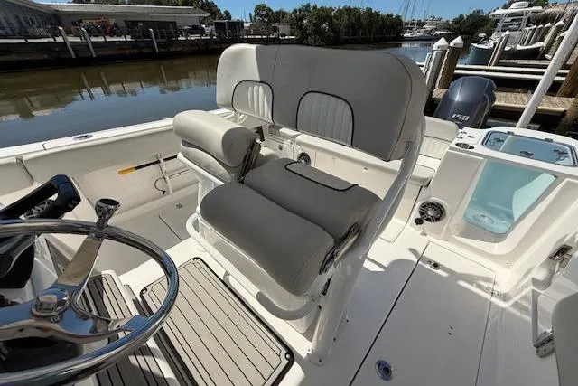 Slide: The Image of 2023 Sea Fox 268 Commander boat interior with dual seating and steering wheel. - 22