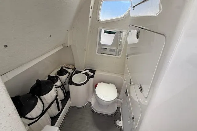 Slide: The Image of 2023 Sea Fox 268 Commander boat interior with toilet and storage compartments. - 28