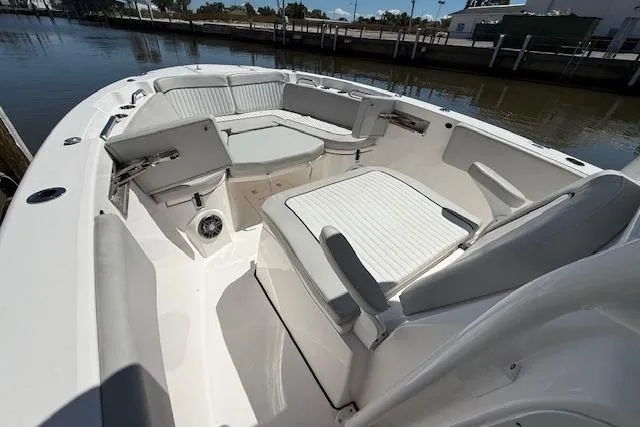 Slide: The Image of 2023 Sea Fox 268 Commander boat interior with cushioned seating and storage compartments. - 33