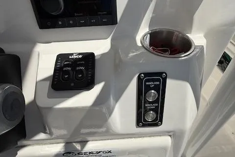 Slide: The Image of Control panel of 2023 Sea Fox 268 Commander boat with cup holder and windlass controls. - 42
