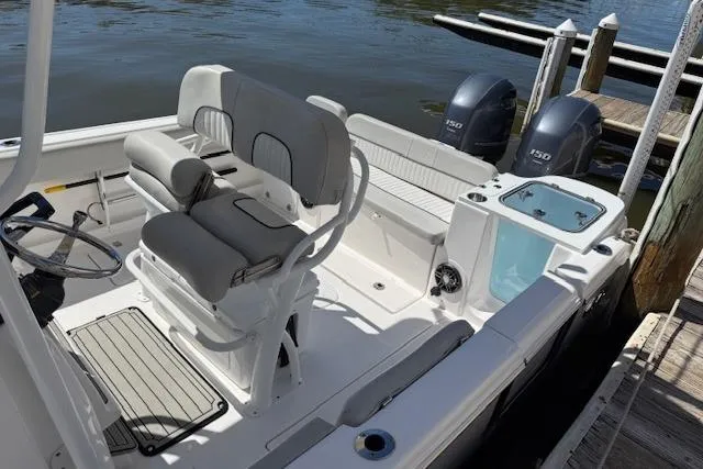 Slide: The Image of 2023 Sea Fox 268 Commander boat interior with dual engines and seating. - 7