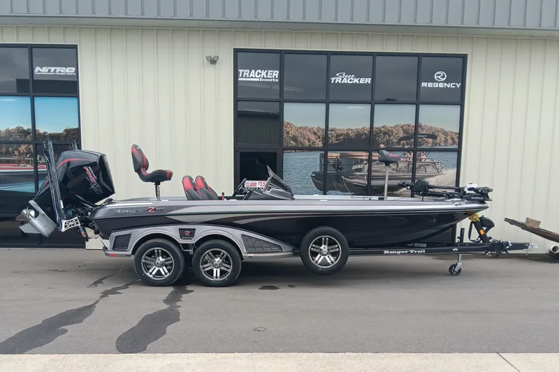 The Image of 2026 Ranger Z520 boat with trailer parked outside showroom. - 0