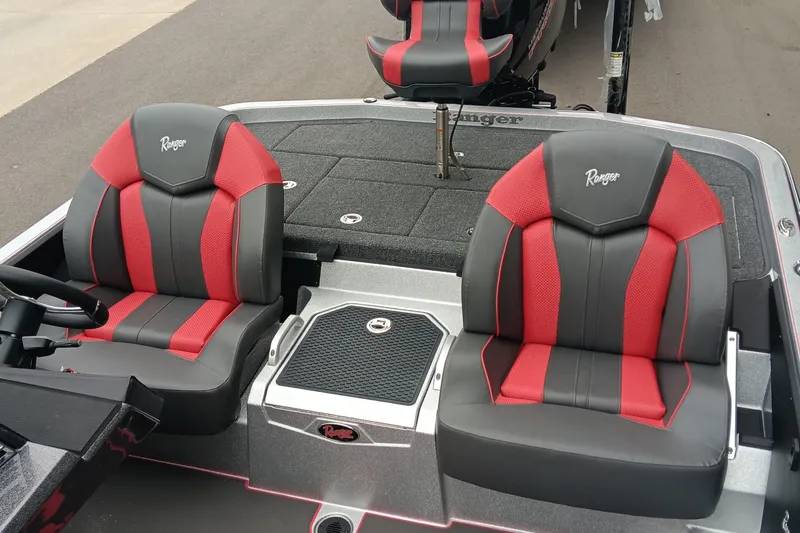 Slide: The Image of 2026 Ranger Z520 boat interior with red and black seats, sleek design. - 14