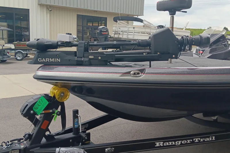 Slide: The Image of 2026 Ranger Z520 boat with Garmin equipment on trailer, parked outside dealership. - 5