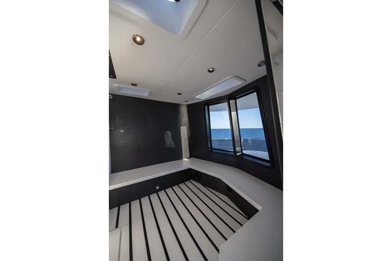 Slide: The Image of Interior of 2023 Canados Expedition Yacht with modern design and ocean view windows. - 13