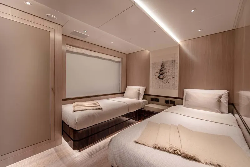 Slide: The Image of Luxurious twin bedroom in 2023 Canados Expedition Yacht, featuring modern design and cozy ambiance. - 20