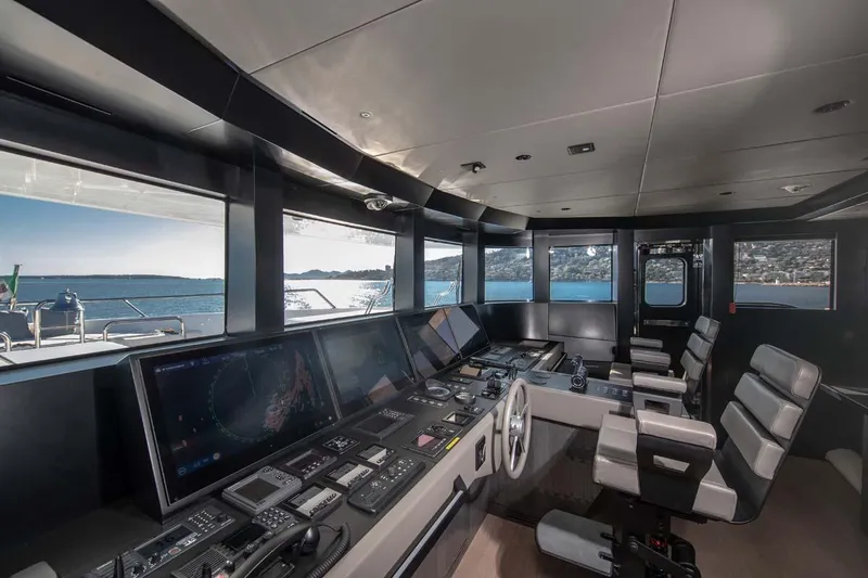 Slide: The Image of 2023 Canados Expedition Yacht cockpit with advanced navigation systems and panoramic sea views. - 25