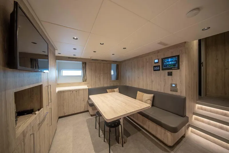 Slide: The Image of Luxurious interior of 2023 Canados Expedition Yacht with modern seating and control panels. - 27