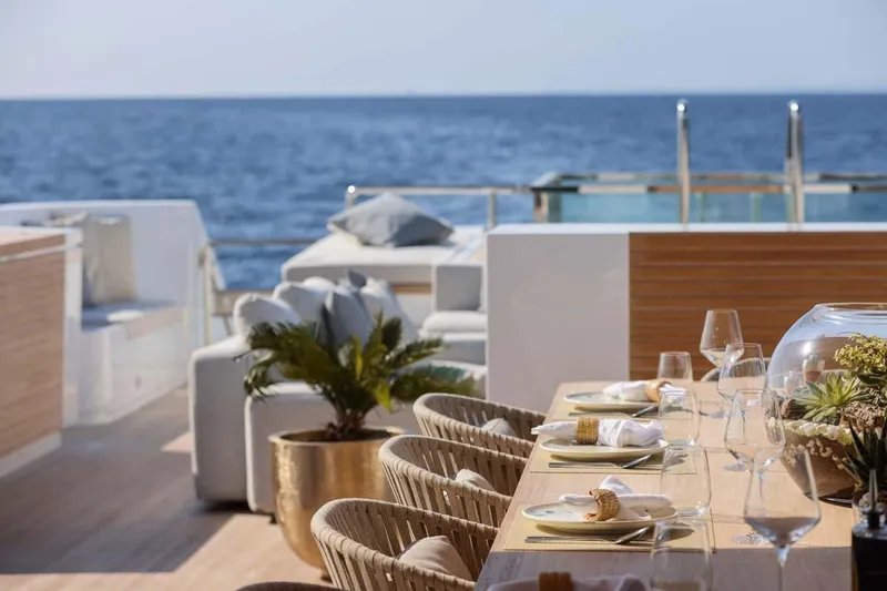 Slide: The Image of Luxurious dining setup on 2023 Canados Expedition Yacht with ocean view. - 29