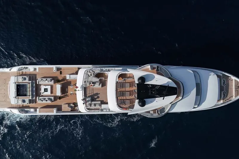 Slide: The Image of Top view of 2023 Canados Expedition Yacht cruising on open water. - 46