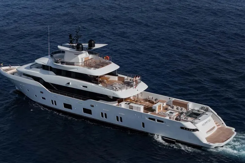 Slide: The Image of 2023 Canados Expedition Yacht cruising on open sea, showcasing luxury design and spacious decks. - 47