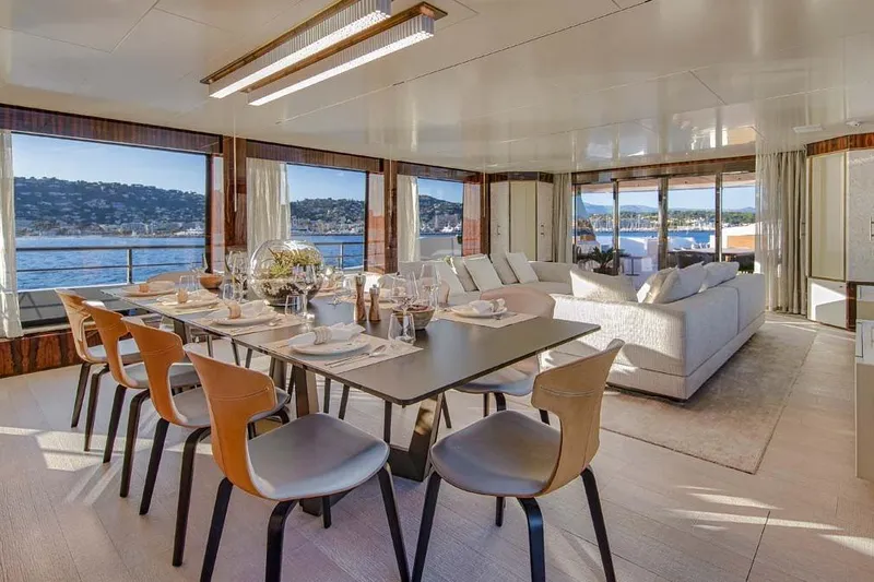 Slide: The Image of Luxurious interior of 2023 Canados Expedition Yacht with elegant dining and seating area. - 5