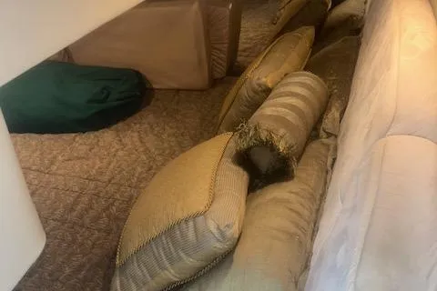 Slide: The Image of Interior cabin of 2003 Formula 370 Super Sport with cushions and seating. - 19