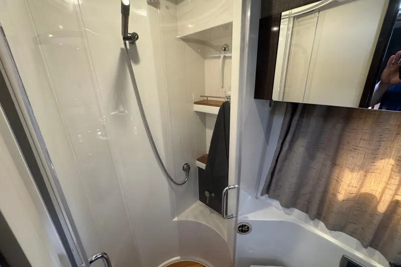 Slide: The Image of Shower area in 2017 Sea Ray Sundancer 400 yacht, featuring modern fixtures and elegant design. - 26