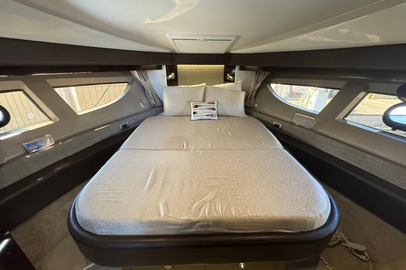 Slide: The Image of Luxurious cabin interior of 2017 Sea Ray Sundancer 400 yacht with comfortable bedding. - 27