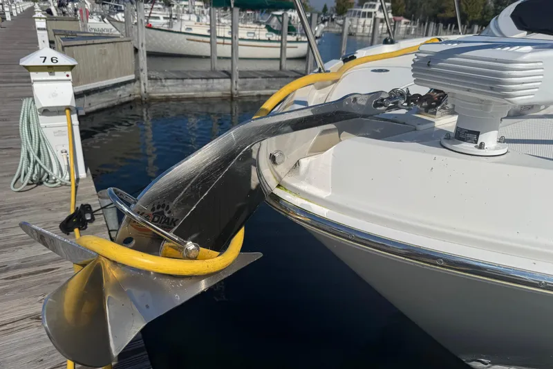 Slide: The Image of 2017 Sea Ray Sundancer 400 yacht with anchor and docked at marina. - 3