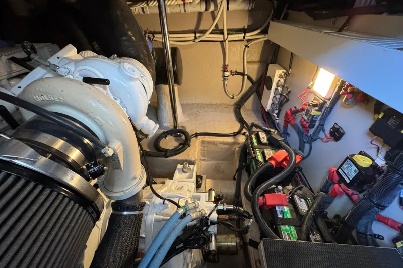 Slide: The Image of Engine room of 2017 Sea Ray Sundancer 400 with visible components and wiring. - 37