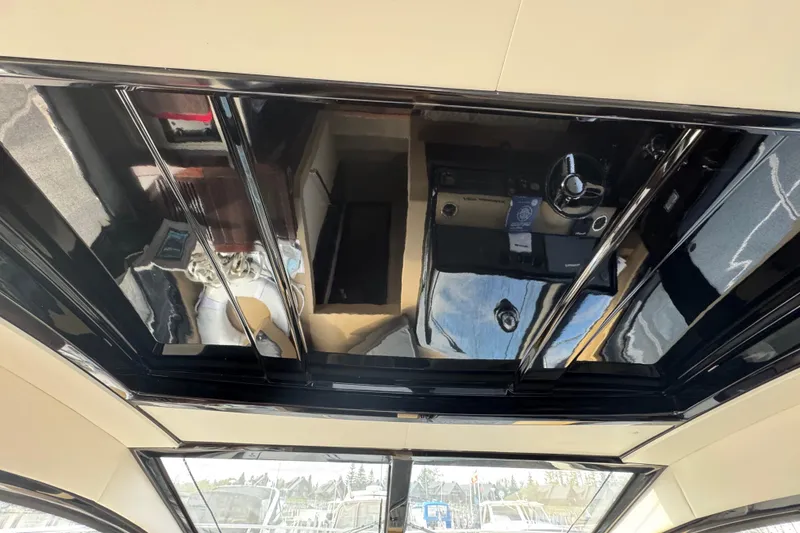 Slide: The Image of Interior view of 2017 Sea Ray Sundancer 400 yacht with sleek, reflective surfaces. - 43