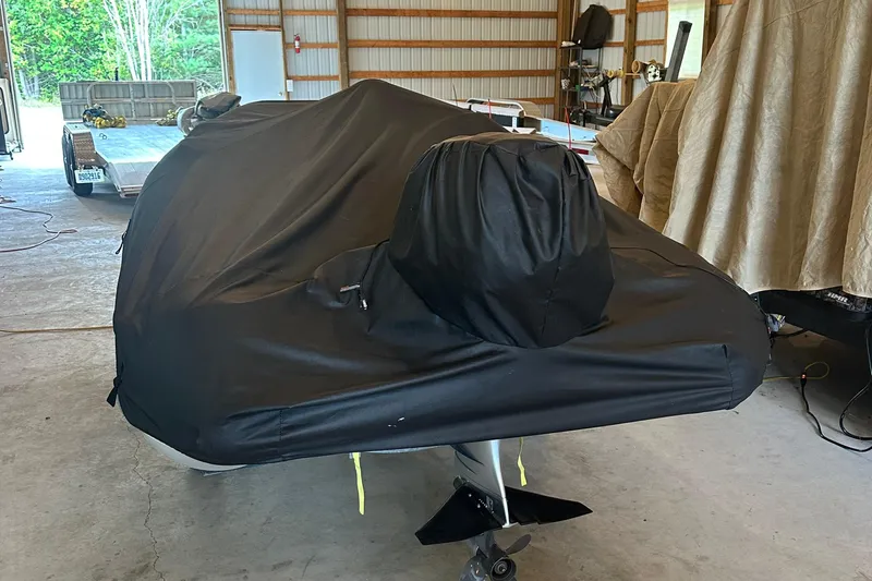 Slide: The Image of Covered 2017 Sea Ray Sundancer 400 boat in storage facility. - 49