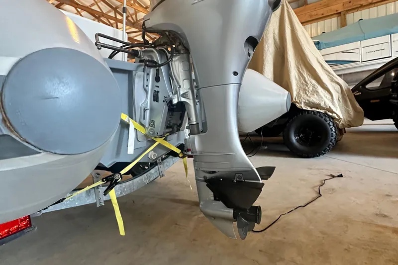 Slide: The Image of 2017 Sea Ray Sundancer 400 outboard motor in a garage setting. - 52