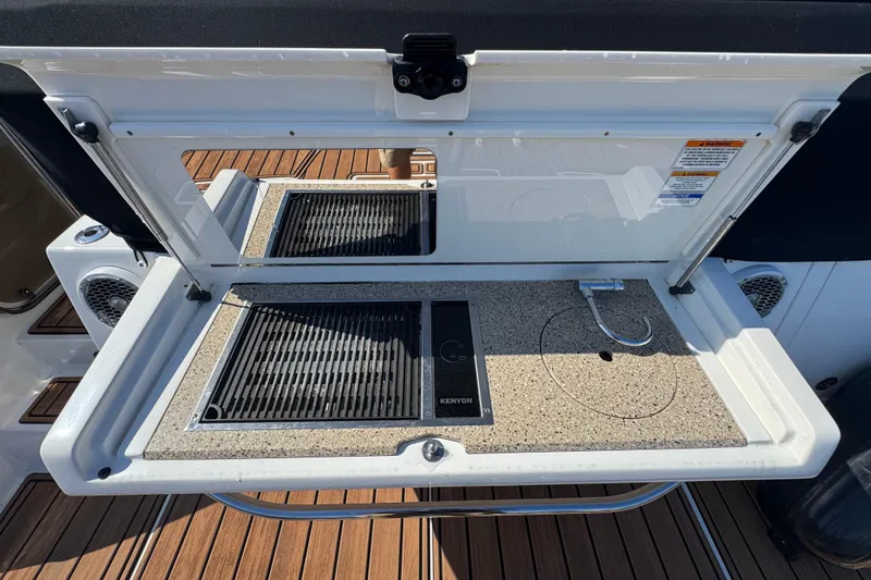 Slide: The Image of Outdoor kitchen on 2017 Sea Ray Sundancer 400 yacht with grill and sink. - 8