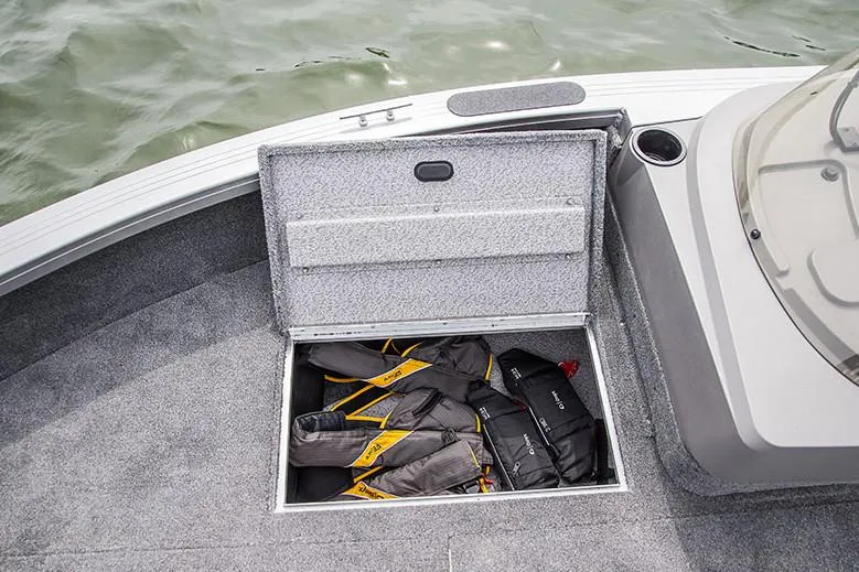 Slide: The Image of 2018 Crestliner 1750 Fish Hawk SC boat with powerful outboard motor in a dealership lot. - 7